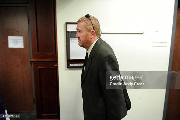 Lead defense attorney for James Holmes, Daniel King, heads to a status hearing at the Arapahoe County Justice Center Tuesday morning, June 25, 2013....