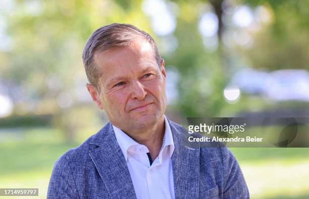 Ferenc Krausz poses for photographers after co-winning the Nobel Prize in Physics on October 03, 2023 in Garching, Germany. Krausz, who works at the...