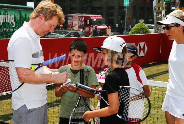 Tennis champions Jim Courier and...