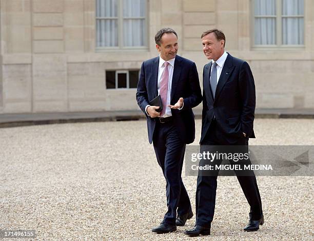 Jim Hagemann Snabe of Germany, co-CEO of German software maker SAP and Martin Senn of Switzerland, Chief Executive Officer at Zurich Insurance arrive...