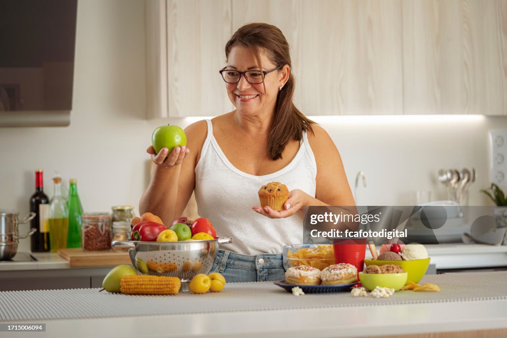 Woman chooses healthy food rather than junk food