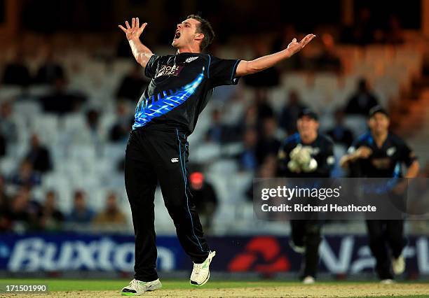 Mitchell McClenaghan of New Zealand celebrates taking the wicket of Luke Wright during the 1st Natwest International T20 match between England and...