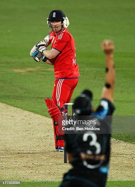 Eoin Morgan of England looks on as he is caught out by Ross Taylor of New Zealand during the 1st Natwest International T20 match between England and...