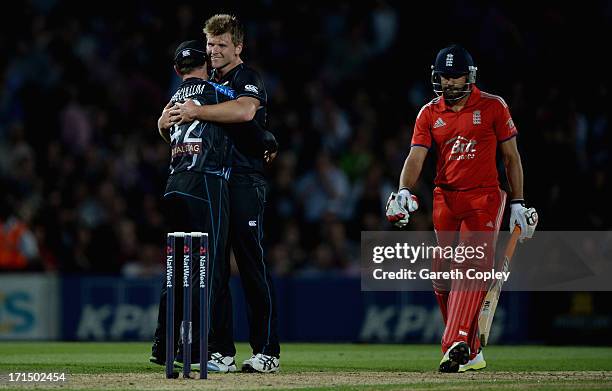 Corey Anderson of New Zealand celebrates with captain Brendon McCullum after winning the 1st NatWest International T20 match between England and New...