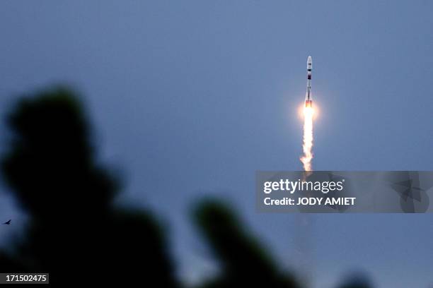 Russian Soyouz rocket, carrying four O3b Satellite Constellation, is launched from Kourou space base in the French overseas department of Guiana on...