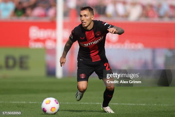 Alex Grimaldo of Bayer Leverkusen controls the ball during the Bundesliga match between 1. FSV Mainz 05 and Bayer 04 Leverkusen at MEWA Arena on...