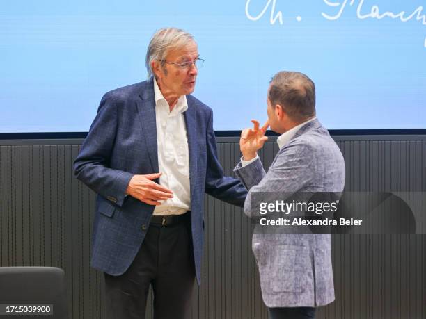 Ferenc Krausz , who was co-winning the Nobel Prize in Physics this morning, talks to former Nobel prize winner Theodor Haensch after a news...