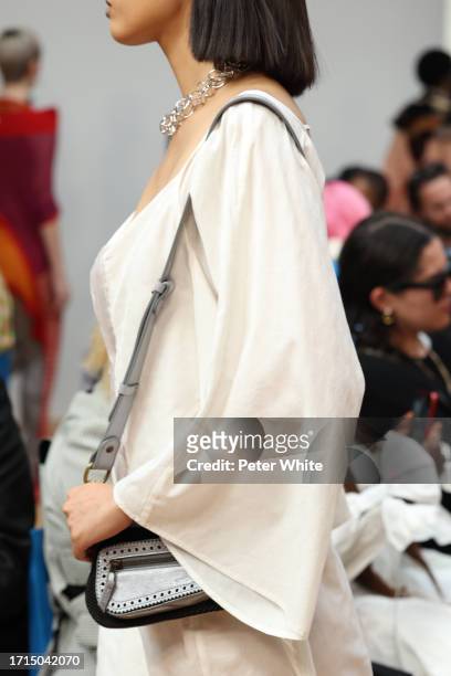 Model, bag detail, walks the runway during the Kiko Kostadinov Womenswear Spring/Summer 2024 show as part of Paris Fashion Week on October 03, 2023...