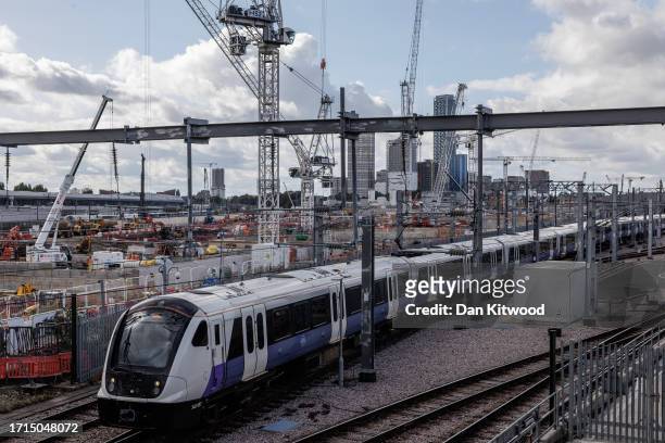 Train to Sheffield runs past as construction continues on the Old Oak Common HS2 site on October 03, 2023 in London, England. Speculation about the...