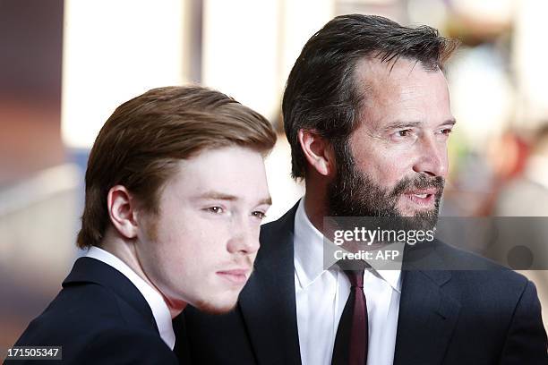 British actor James Purefoy poses for photographers while arriving for the Premiere of West End musical Charlie and the Chocolate Factory, at the...