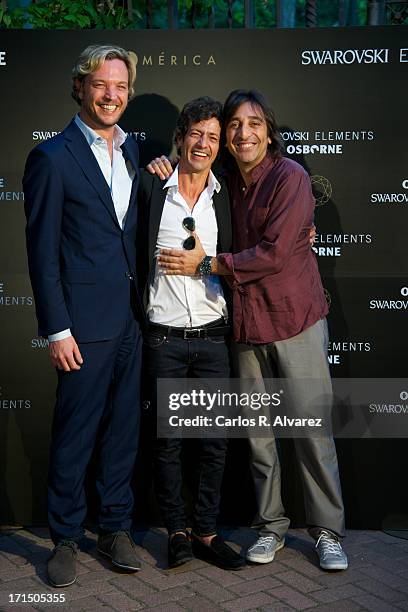 Markus Langes-Swarovski, Willie Marquez and Antonio Carmona attend Swarovski-Osborne Bull illumination at the Casa America on June 25, 2013 in...