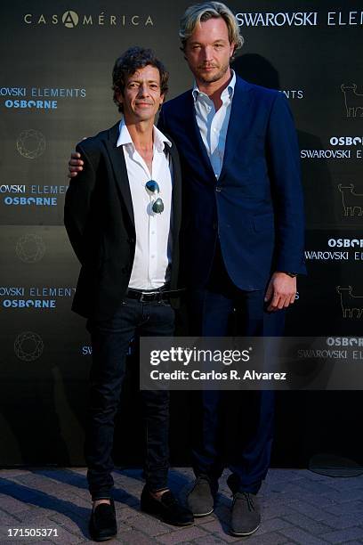 Markus Langes-Swarovski and Willie Marquez attend Swarovski-Osborne Bull illumination at the Casa America on June 25, 2013 in Madrid, Spain.