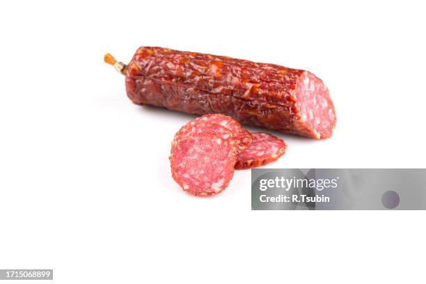 sliced salami isolated on a white background - chorizo imagens e fotografias de stock