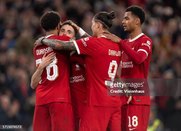 Diogo Jota of Liverpool celebrates scoring with team mates Jarell Quansah, Darwin Nunez and Cody Gakpo during the Carabao Cup Third Round match...