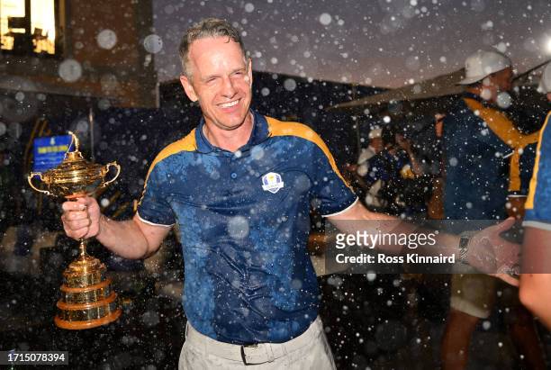 Luke Donald, Captain of Team Europe gets sprayed with champagne during the celebrations after the Sunday singles matches of the 2023 Ryder Cup at...