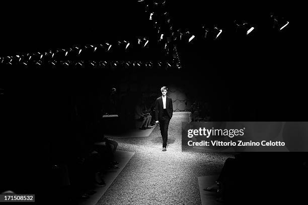 Model walks the runway at the Z Zegna show during Milan Menswear Fashion Week Spring Summer 2014 on June 25, 2013 in Milan, Italy.