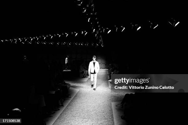 Model walks the runway at the Z Zegna show during Milan Menswear Fashion Week Spring Summer 2014 on June 25, 2013 in Milan, Italy.