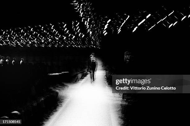 Model walks the runway at the Z Zegna show during Milan Menswear Fashion Week Spring Summer 2014 on June 25, 2013 in Milan, Italy.