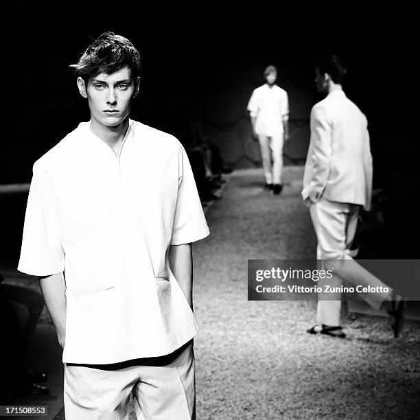 Model walks the runway at the Z Zegna show during Milan Menswear Fashion Week Spring Summer 2014 on June 25, 2013 in Milan, Italy.