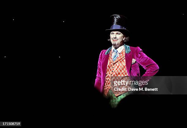 Cast member Douglas Hodge bows at the curtain call during the press night performance of 'Charlie And The Chocolate Factory' at the Theatre Royal...