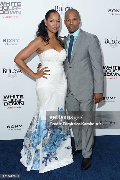 Actors Garcelle Beauvais and Jamie Foxx attend the "White House Down" New York premiere at Ziegfeld Theater on June 25, 2013 in New York City.