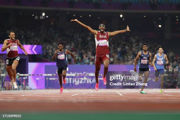 Abderrahman Samba of Qatar celebrates winning the men's 400m hurdles final athletics event on day 10 of the 19th Asian Games at Hangzhou Olympic...