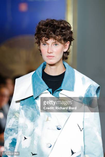 Model walks the runway during the GongQingCheng China Post And ODI Show at Centre Culturel de Chine as part of Paris Fashion Week on October 03, 2023...