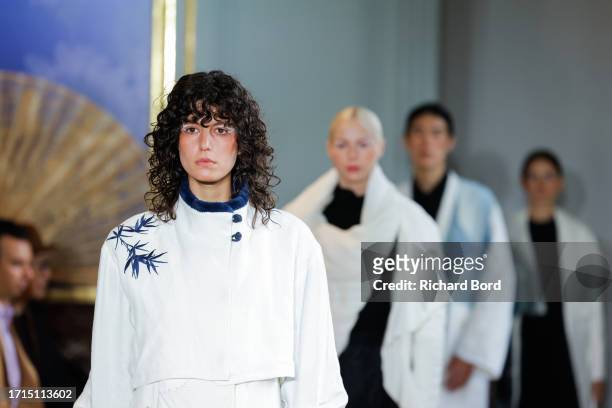 Models walk the runway during the GongQingCheng China Post And ODI Show at Centre Culturel de Chine as part of Paris Fashion Week on October 03, 2023...