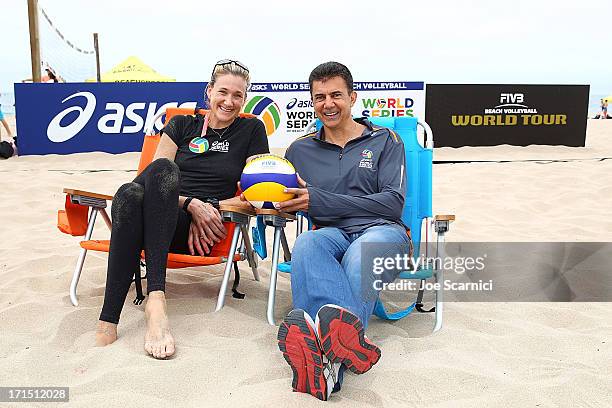 Leonard Armato, CEO and Three-time gold medalist Kerri Walsh Jennings rpose for a photo at the ASICS World Series of Beach Volleyball on June 25,...