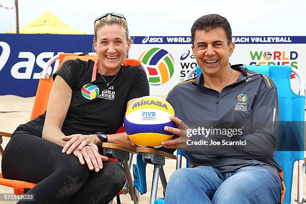 Leonard Armato, CEO and Three-time gold medalist Kerri Walsh Jennings rpose for a photo at the ASICS World Series of Beach Volleyball on June 25,...