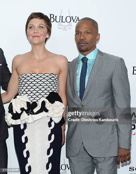 Maggie Gyllenhaal and Jamie Foxx attend "White House Down" New York premiere at Ziegfeld Theater on June 25, 2013 in New York City.