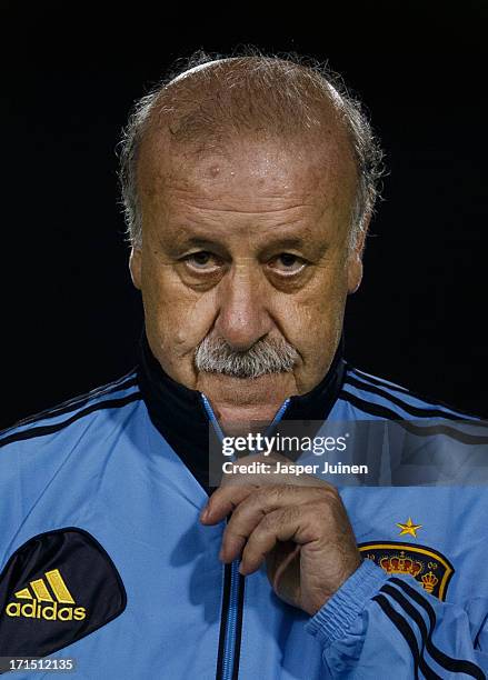 Vicente Del Bosque head coach of Spain holds the zipper of his jacket as he walks off the pitch at the end of a training session ahead of their FIFA...