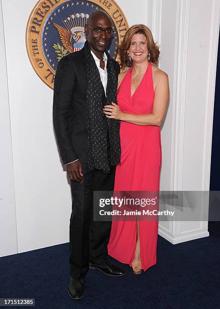 Actor Lance Reddick and Stephanie Day attend "White House Down" New York Premiere at Ziegfeld Theater on June 25, 2013 in New York City.