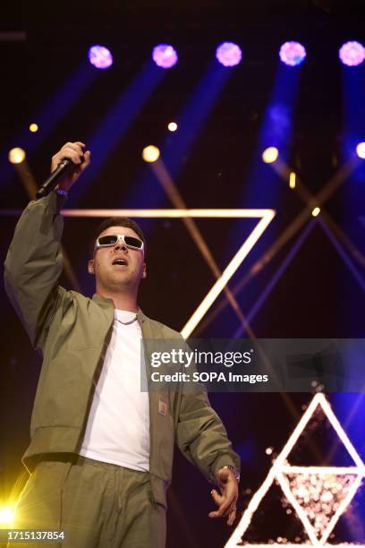 Spanish artist Pedro Luis Dominguez Quevedo known professionally as Quevedo performs live on the stage of the Navarra Arena pavilion in Pamplona. The...