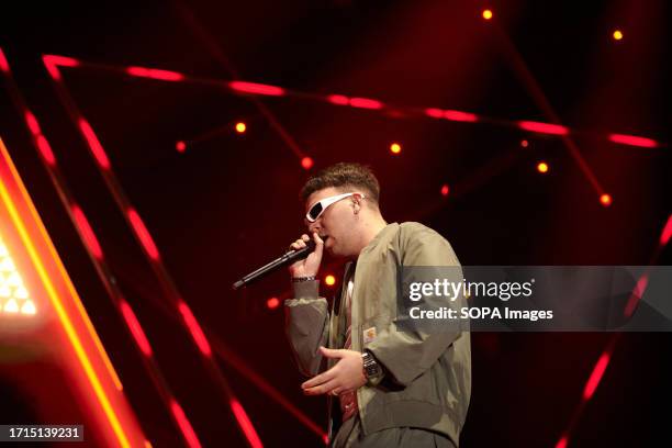 Spanish artist Pedro Luis Dominguez Quevedo known professionally as Quevedo performs live on the stage of the Navarra Arena pavilion in Pamplona. The...