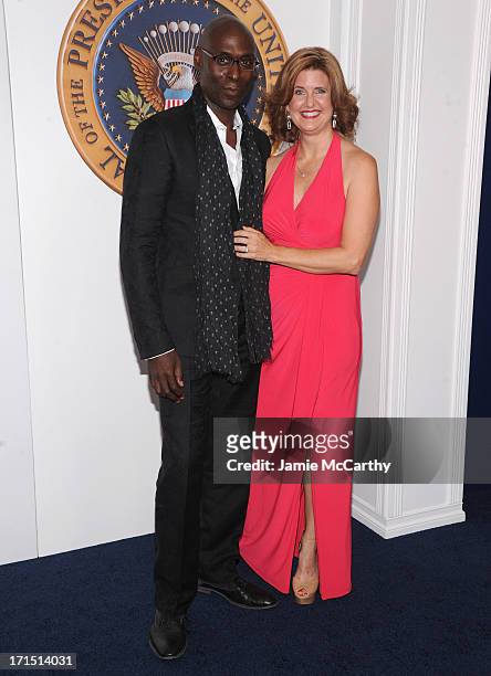 Actor Lance Reddick and Stephanie Day attend "White House Down" New York Premiere at Ziegfeld Theater on June 25, 2013 in New York City.