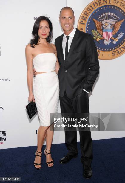 Cristen Barker and Photographer Nigel Barker attend "White House Down" New York Premiere at Ziegfeld Theater on June 25, 2013 in New York City.