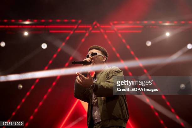 Spanish artist Pedro Luis Dominguez Quevedo known professionally as Quevedo performs live on the stage of the Navarra Arena pavilion in Pamplona. The...