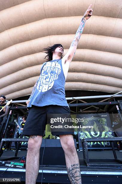 Vocalist Chris Roetter of Like Moths to Flames performs at the Vans Warped Tour at the Cricket Wireless Amphitheater on June 19, 2013 in Chula Vista,...
