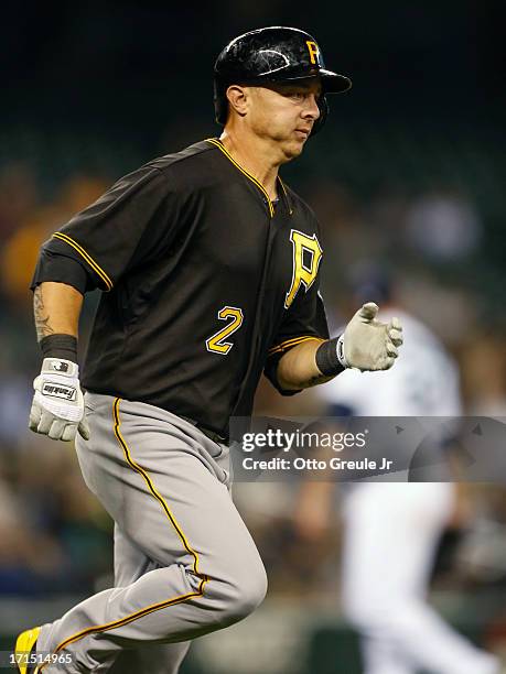 Brandon Inge of the Pittsburgh Pirates rounds the bases after hitting a three-run home run against the Seattle Mariners in the second inning at...