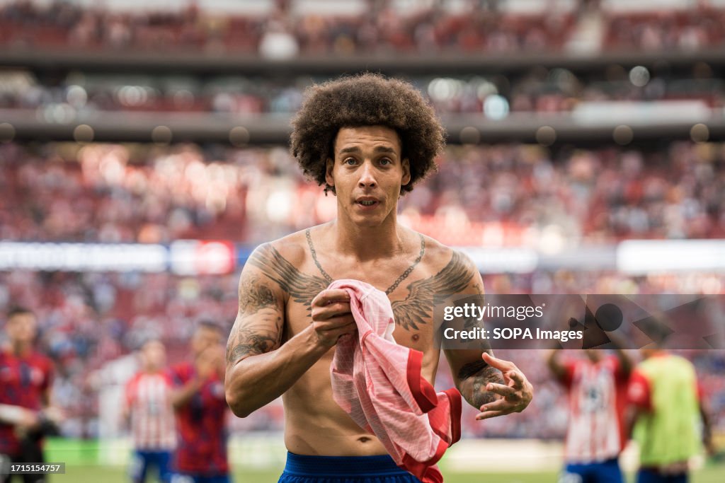 Axel Wisel Axel Witsel of Atletico Madrid gives away his jersey shirt during the ...