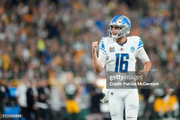 Jared Goff of the Detroit Lions celebrates a touchdown against the Green Bay Packers during the second quarter in the game at Lambeau Field on...