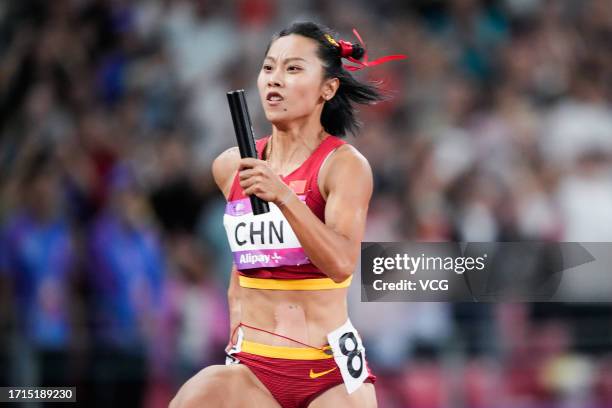 Ge Manqi of Team China competes in the Athletics - Women's 4 x 100m Relay on day ten of the 19th Asian Games at Hangzhou Olympic Sports Centre...