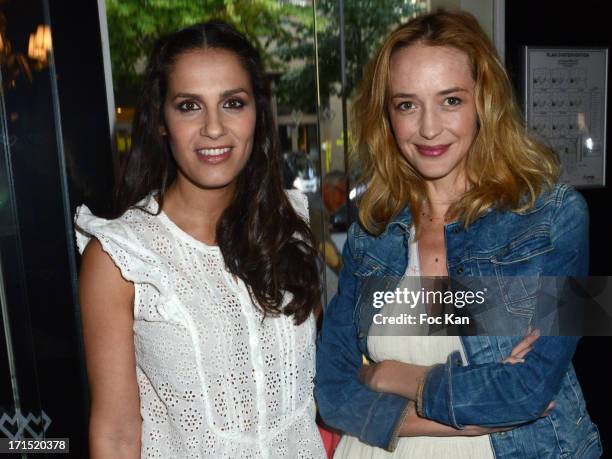 Elisa Tovatiand Helene de Fougerolles attend the 'White Party' at La Villa Maillot on June 25, 2013 in Paris, France.