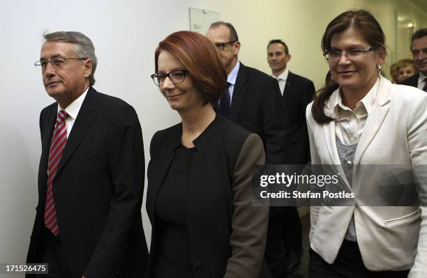 Australian Prime MInister Julia Gillard and supporters enter the caucus room for the leadership ballot at Parliament House on June 26, 2013 in...