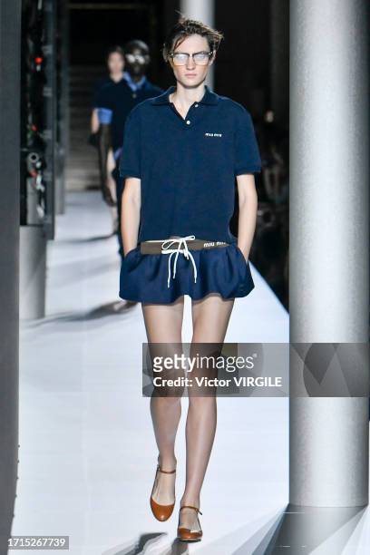 Model walks the runway during the Miu Miu Ready to Wear Spring/Summer 2024 fashion show as part of the Paris Fashion Week on October 3, 2023 in...