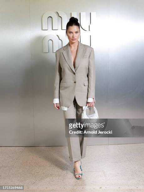 Adriana Lima attends the Miu Miu Womenswear S/S 2024 show as part of Paris Fashion Week at Palais d'Iena on October 03, 2023 in Paris, France.