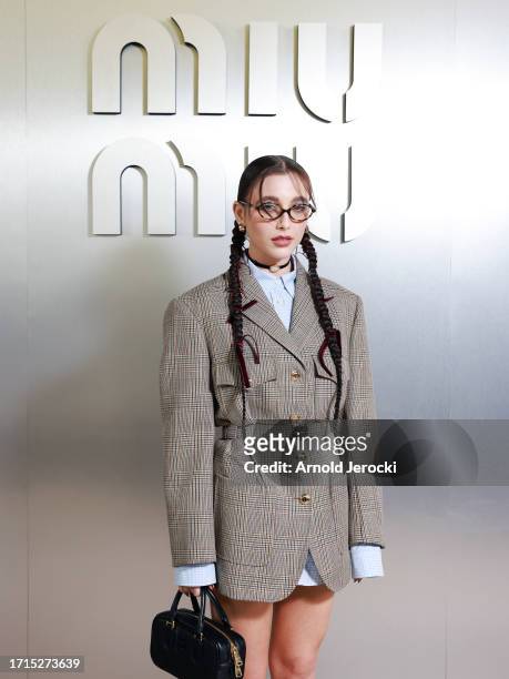 Emma Chamberlain attends the Miu Miu Womenswear S/S 2024 show as part of Paris Fashion Week at Palais d'Iena on October 03, 2023 in Paris, France.