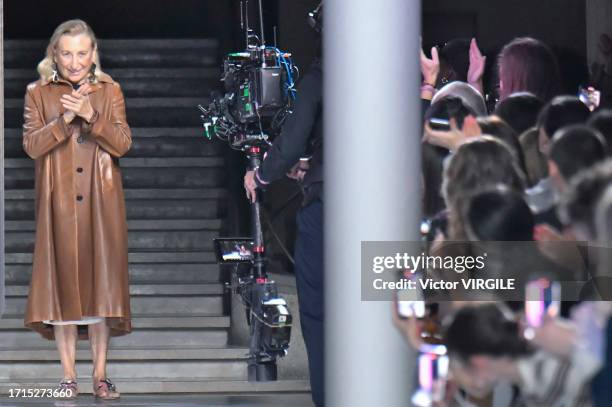 Fashion designer Miuccia Prada walks the runway during the Miu Miu Ready to Wear Spring/Summer 2024 fashion show as part of the Paris Fashion Week on...