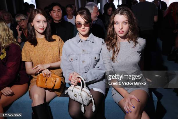 Yoona Lim, Katherine Langford and Ever Anderson attend the Miu Miu Womenswear S/S 2024 show as part of Paris Fashion Week at Palais d'Iena on October...